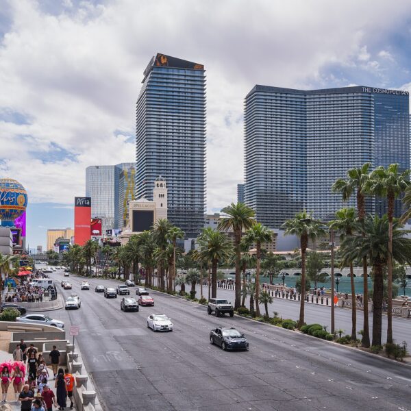 Las Vegas Strip by day, with Horseshoe sign, Paris balloon and Cosmopolitan towers