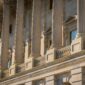 Close-up of columns and exterior architectural details of a historic landmark building.