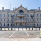 Front facade of the New Jersey State House in Trenton under a clear blue sky