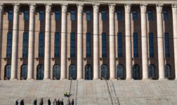 Granite columns and wide front steps of Finland's Parliament House in Helsinki